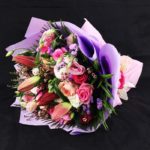 mix_flowers_in_purple_wrapping