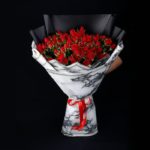 red_spray_rose_in_marble_wrap