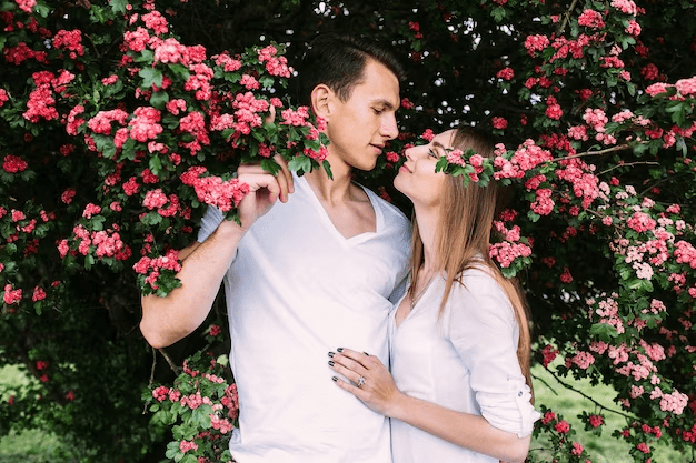 proposing in scenic garden with flowers